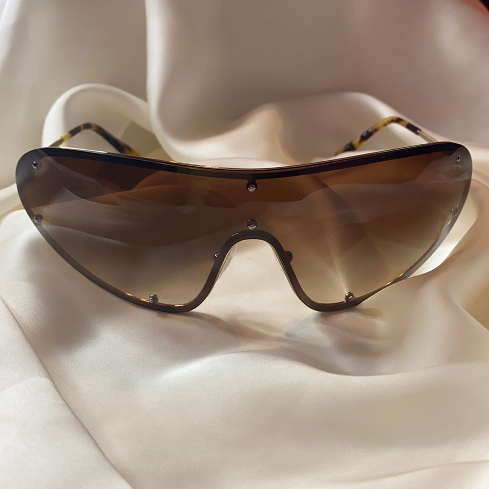 PRADA sunglasses.